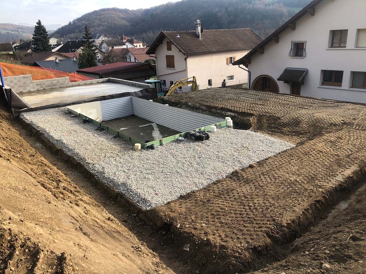 PHOTO DES TRAVAUX D'UNE EXTENSION D'UN GARAGE ET D'UNE PISCINE POUR UN PARTICULIER